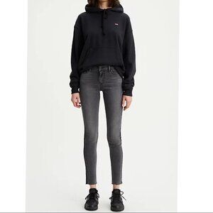 Levi’s 710 Super Skinny Raw Hem Mid Rise Jeans